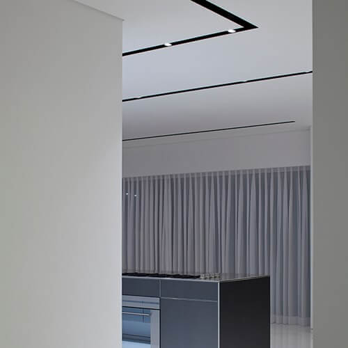 Flos Трековый светильник Light Cut Mini от Flos — в интерьере